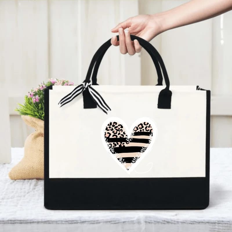 Sac à main en forme de cœur avec imprimé léopard crème et noir et imprimé à rayures pour un usage qu