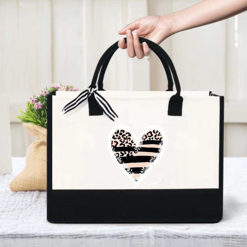 Sac à main en forme de cœur avec imprimé léopard crème et noir et imprimé à rayures pour un usage qu